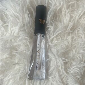 Tahari Clear Lip Gloss with Black Cap and Gold Logo
